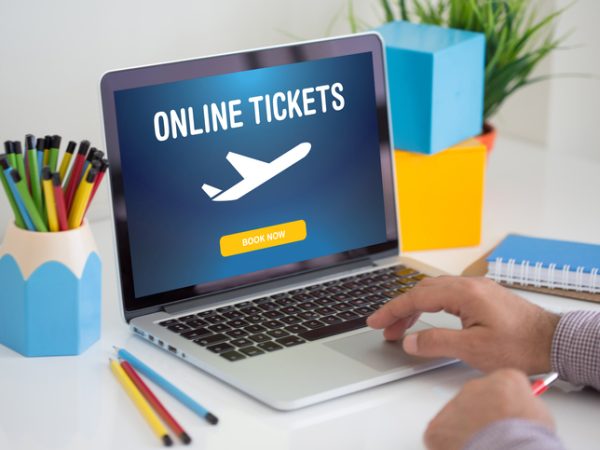Buying airline tickets on computer Buying airline tickets on computer